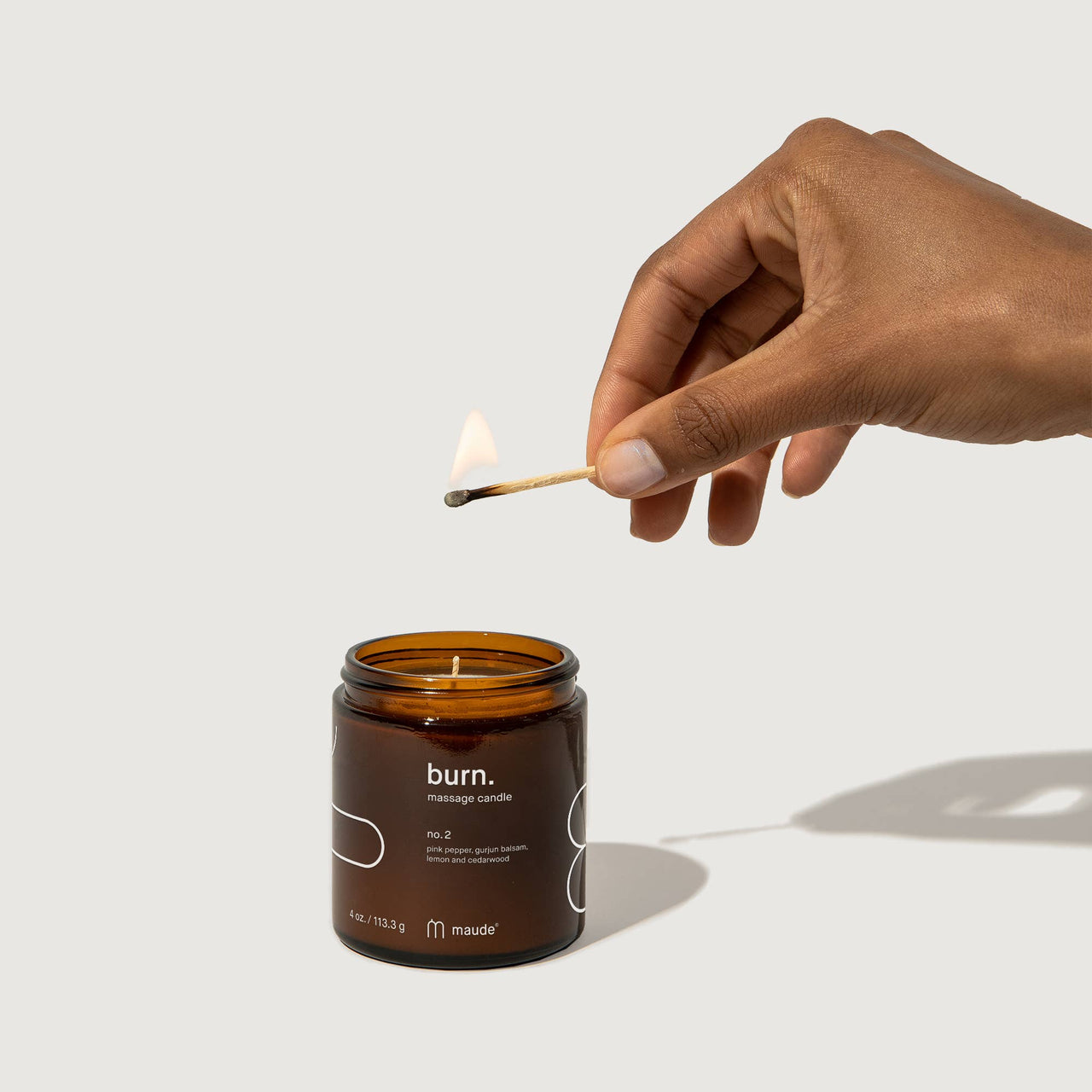 Burn no. 2 - massage candle, pink pepper, lemon, cedarwood.